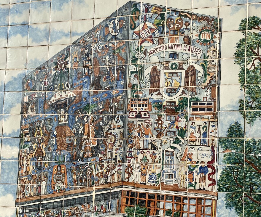 multi colored tile mural of a building