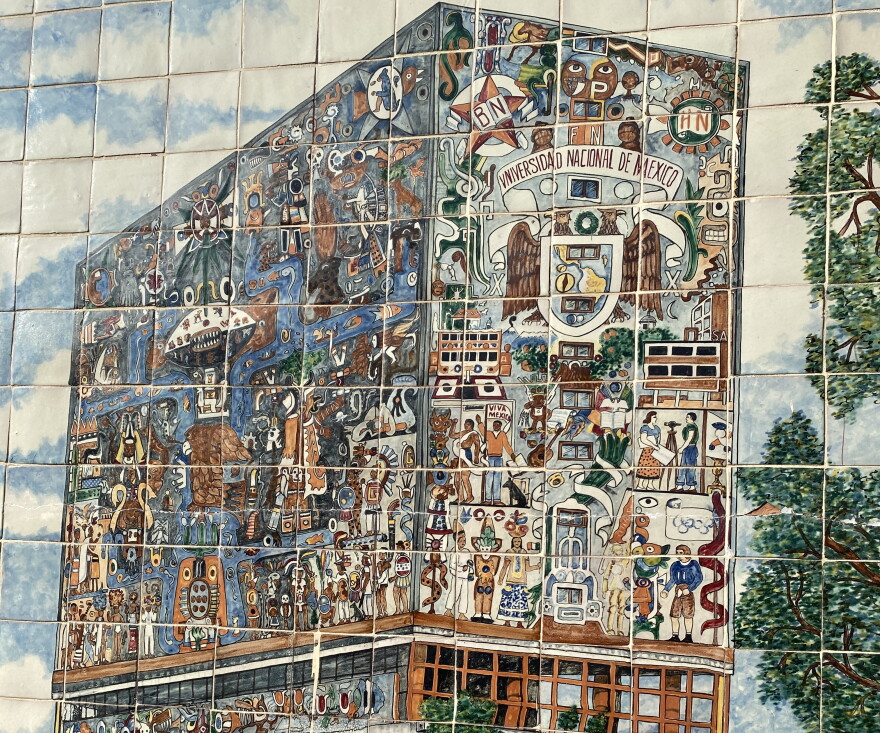 multi colored tile mural of a building