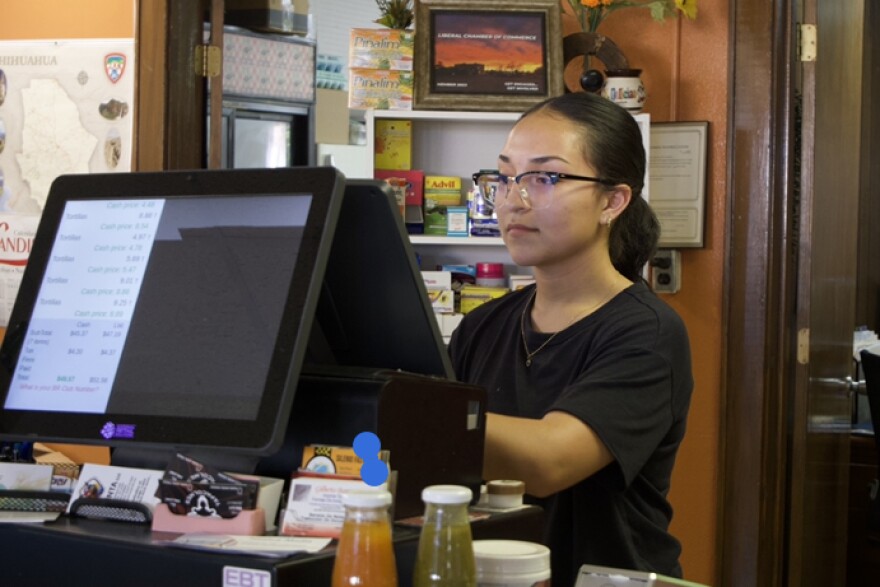 Gisel Tarango works with her parents at the tortilleria. She is a second generation immigrant, and often translates for her parents.