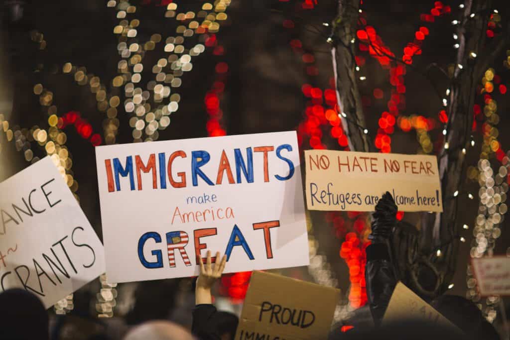Immigrants advocating for voting rights and inclusion at a rally.