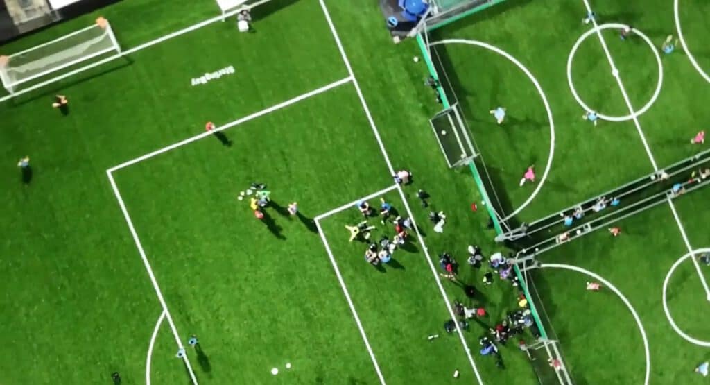 Community soccer game on a vibrant outdoor field in Chicago.