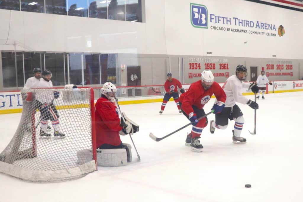 Puerto Rican community enjoying hockey at Chicago's Fifth Third Arena.