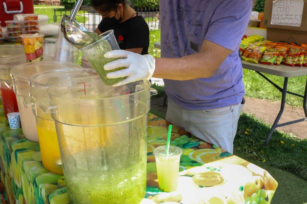 Family making traditional aguas frescas in Chicago's Southside neighborhood.