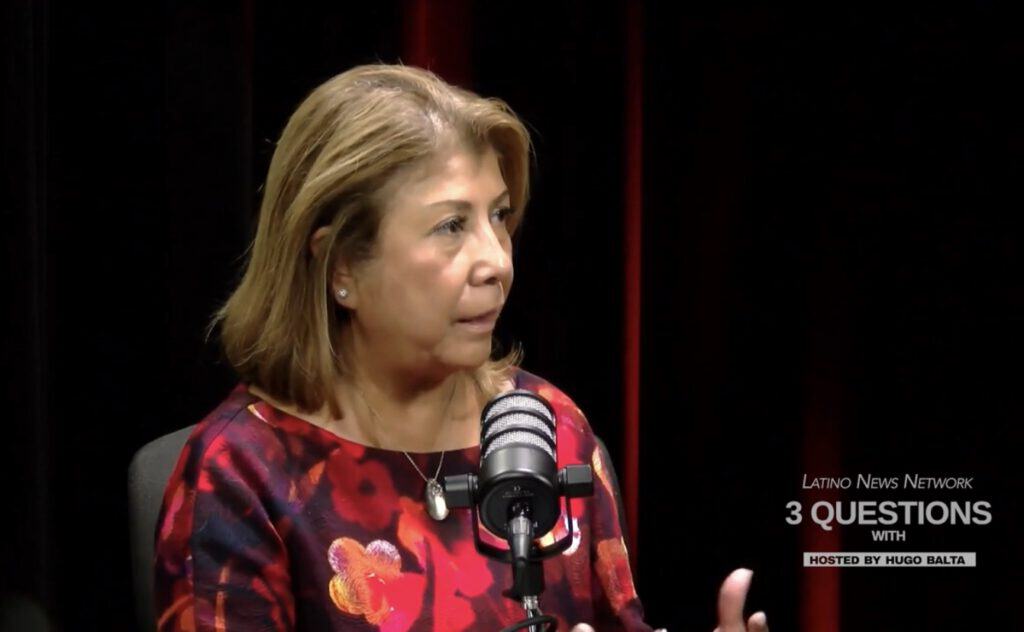 Esther Corpuz speaking at Latino News Network about serving hard-to-reach populations.