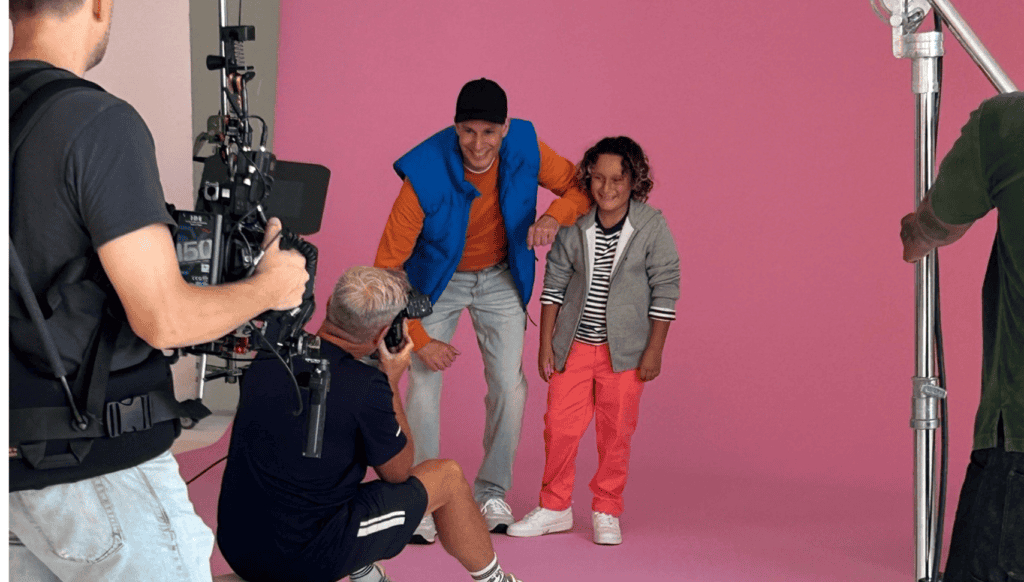 Latino boys filming holiday campaign with Macy’s, behind the scenes.
