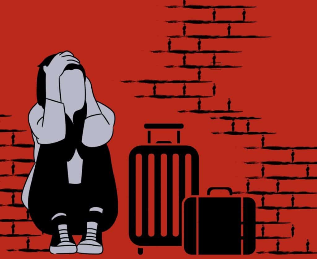 Desperate person sitting on stairs with luggage, feeling overwhelmed and anxious.
