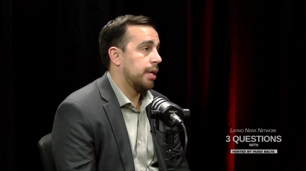 Roberto Valdez Jr. speaking at Latino News Network event on elevating Latino voices.