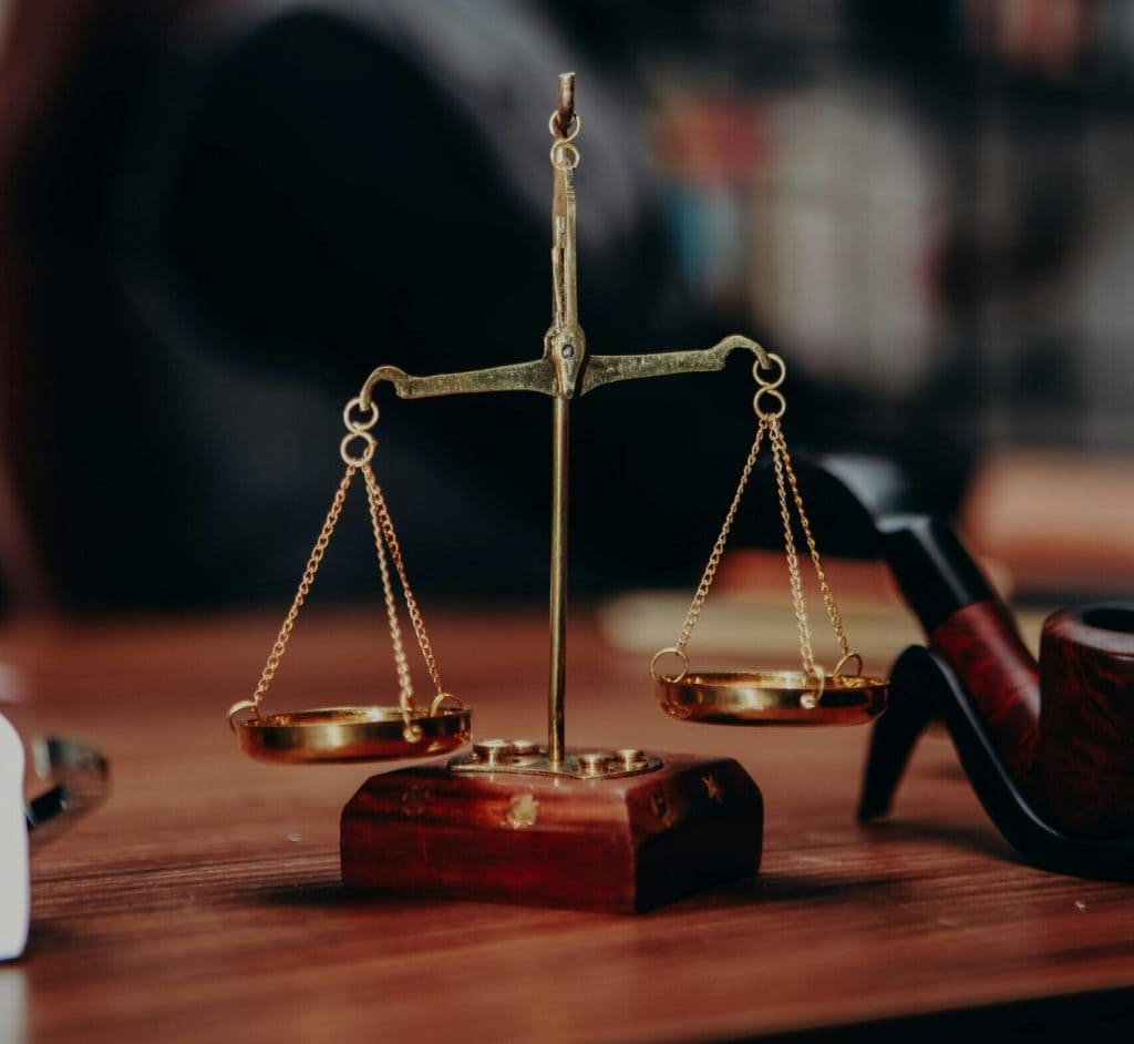 Legal scales representing judicial diversity and fairness in Illinois.