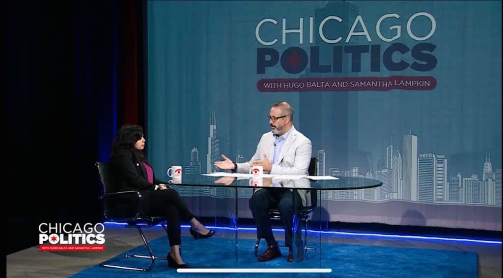 Chicago Politics TV show with Hugo Balta and Samantha Lampkin discussing local issues.