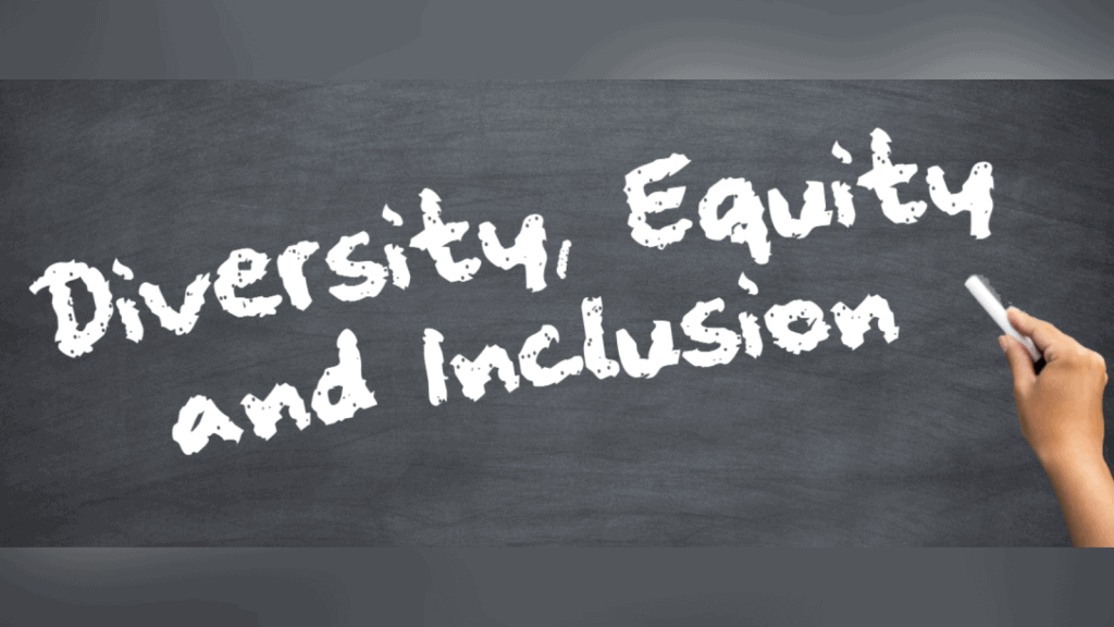 Diversity, Equity, and Inclusion concepts written on a chalkboard for DEI programs.