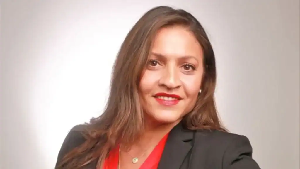 Empowered Latina woman smiling, representing democracy and leadership.