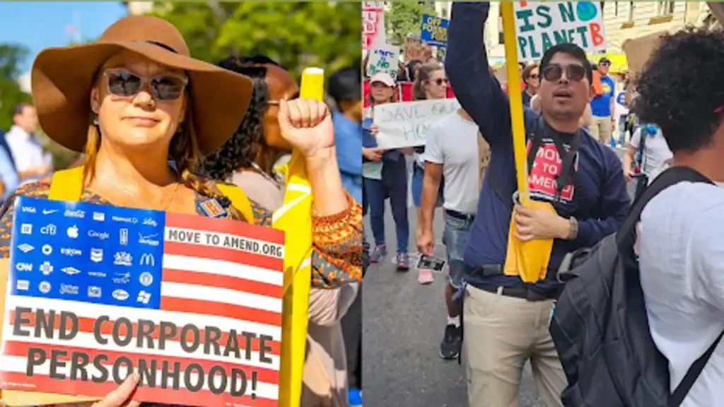 Protesters advocating for corporate power reform at Move To Amend rally.