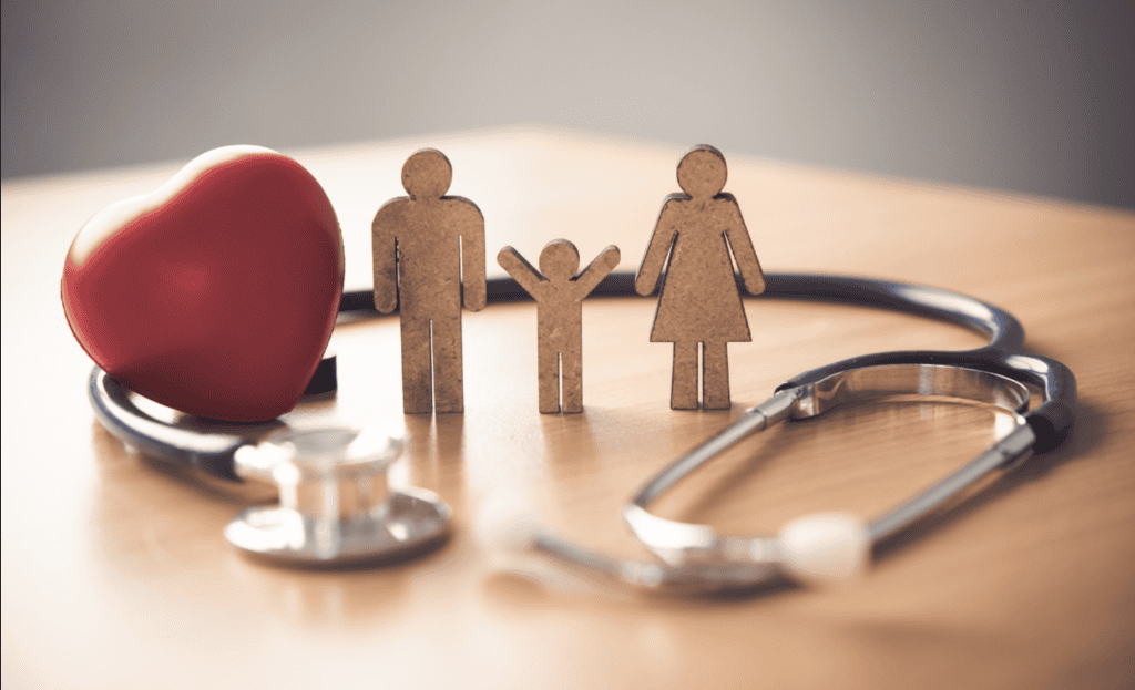 Healthy living promotion with a stethoscope, heart, and family figures representing Hispanic communi.
