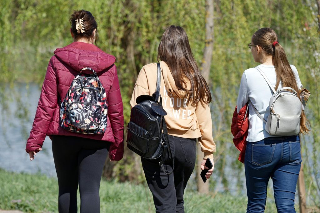 girls, women, walking, students, park, outdoors, people, backpacks